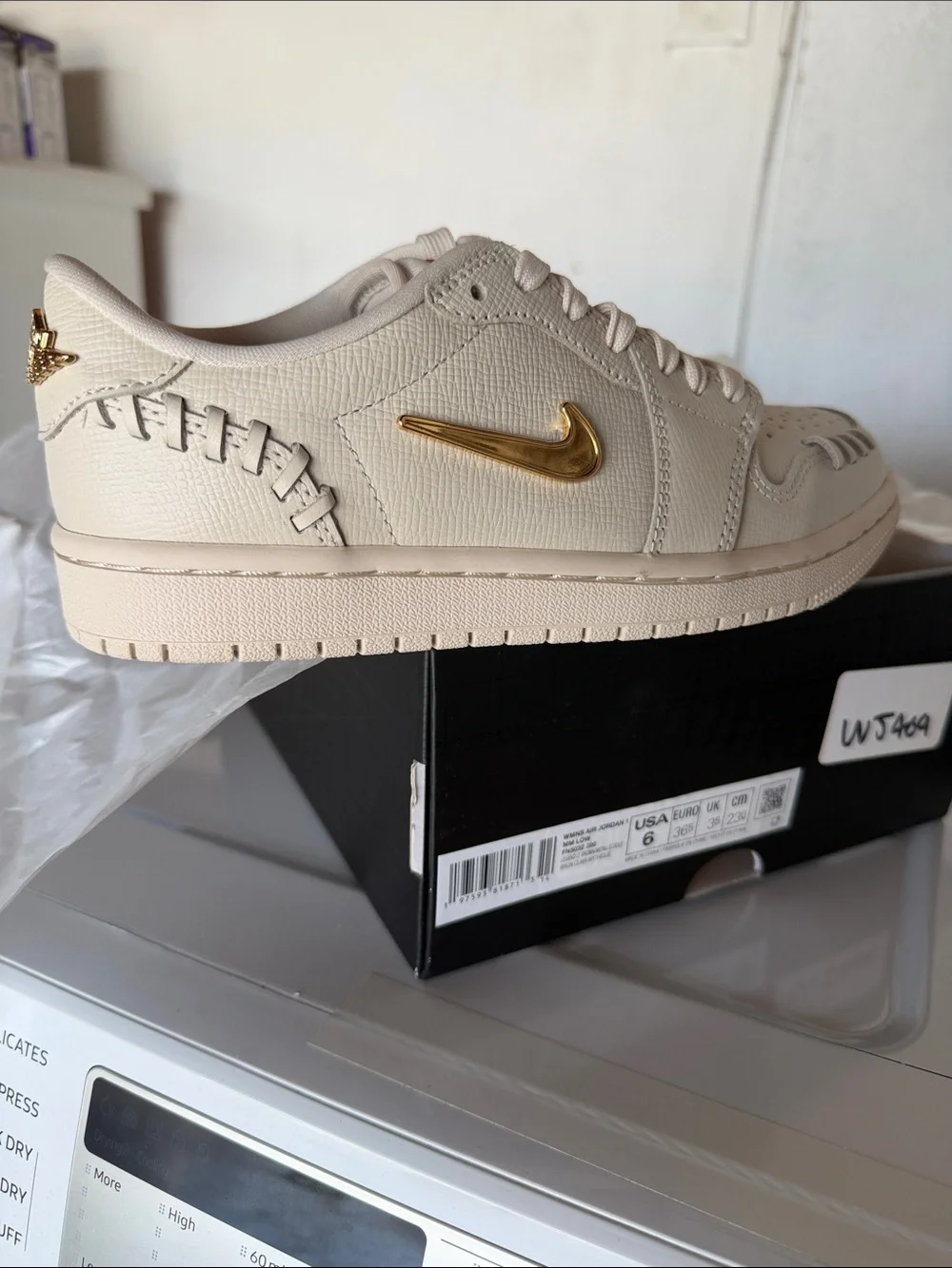 Nike Men’s Tan Low-Top Sneakers with Gold Swoosh